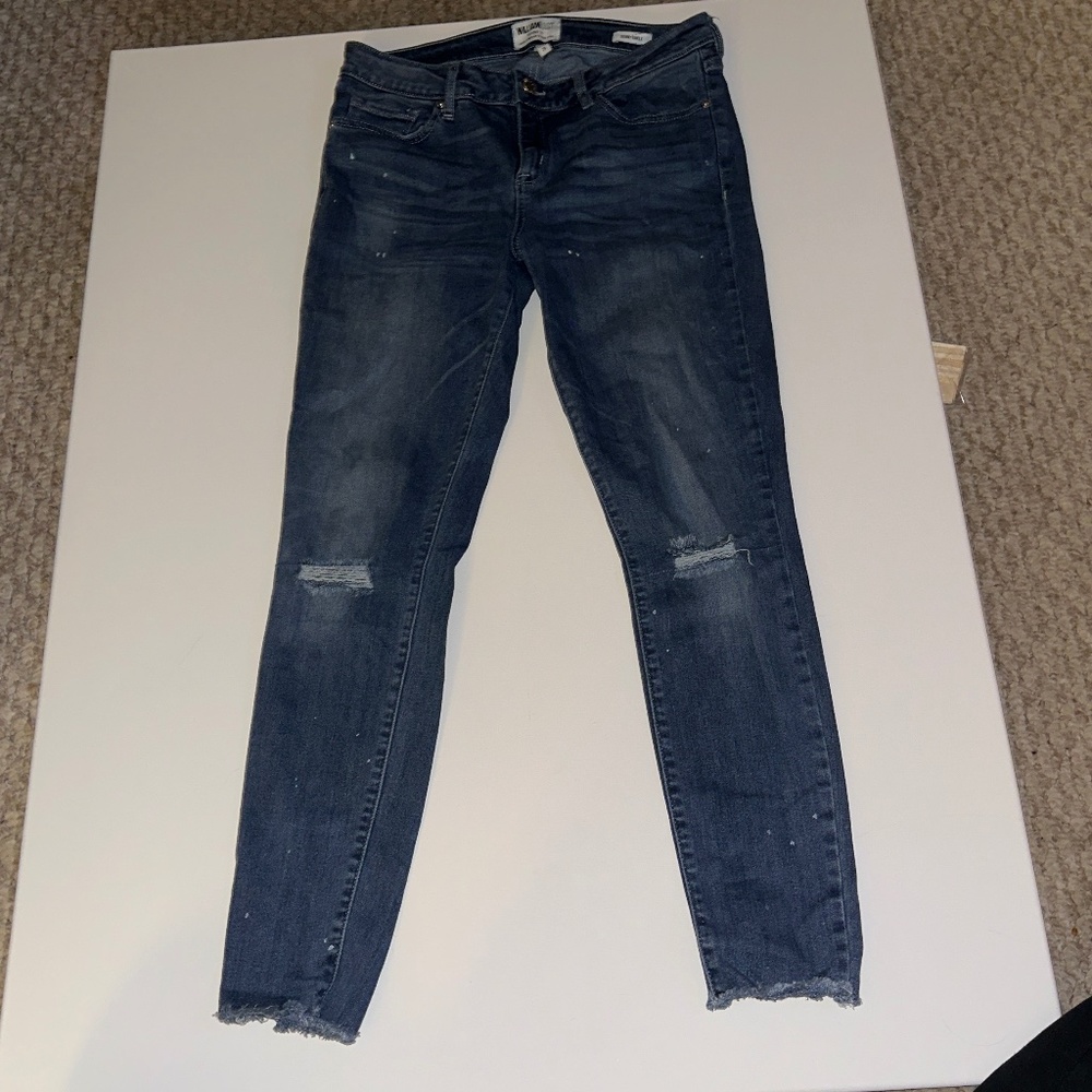 blue distressed jeans